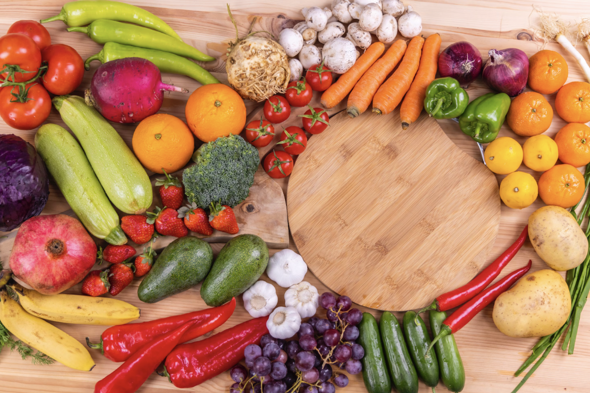 fruits-and-vegetables-arranged-on-wooden-table